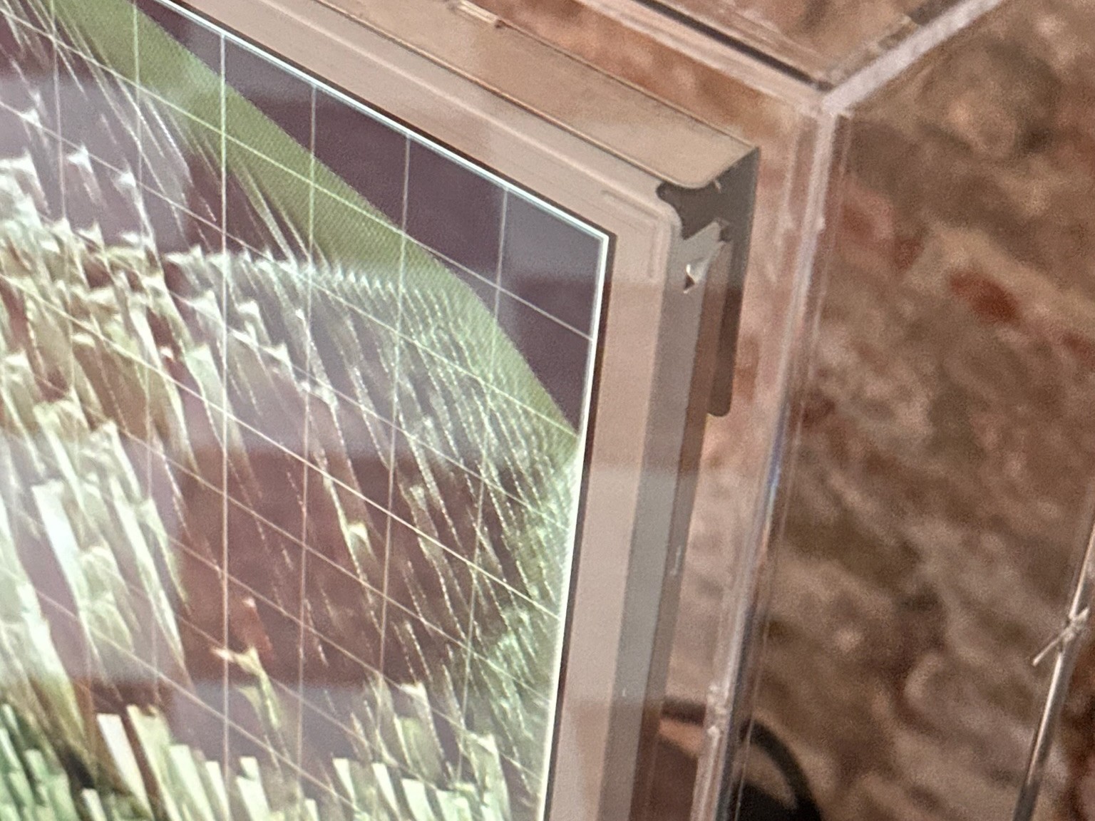 Detail: screen in its acrylic case